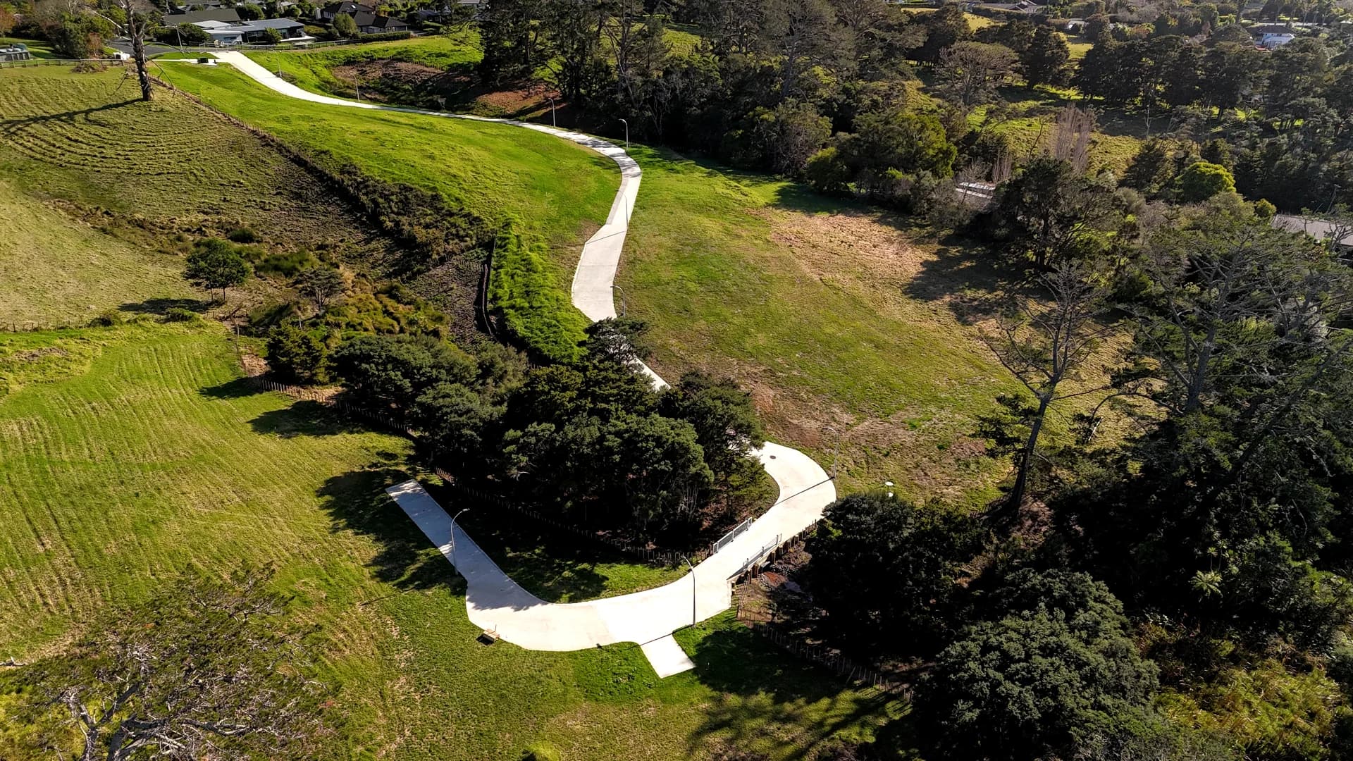 Aerial view of sealed concrete subdivision road, Auckland - Bromley Group